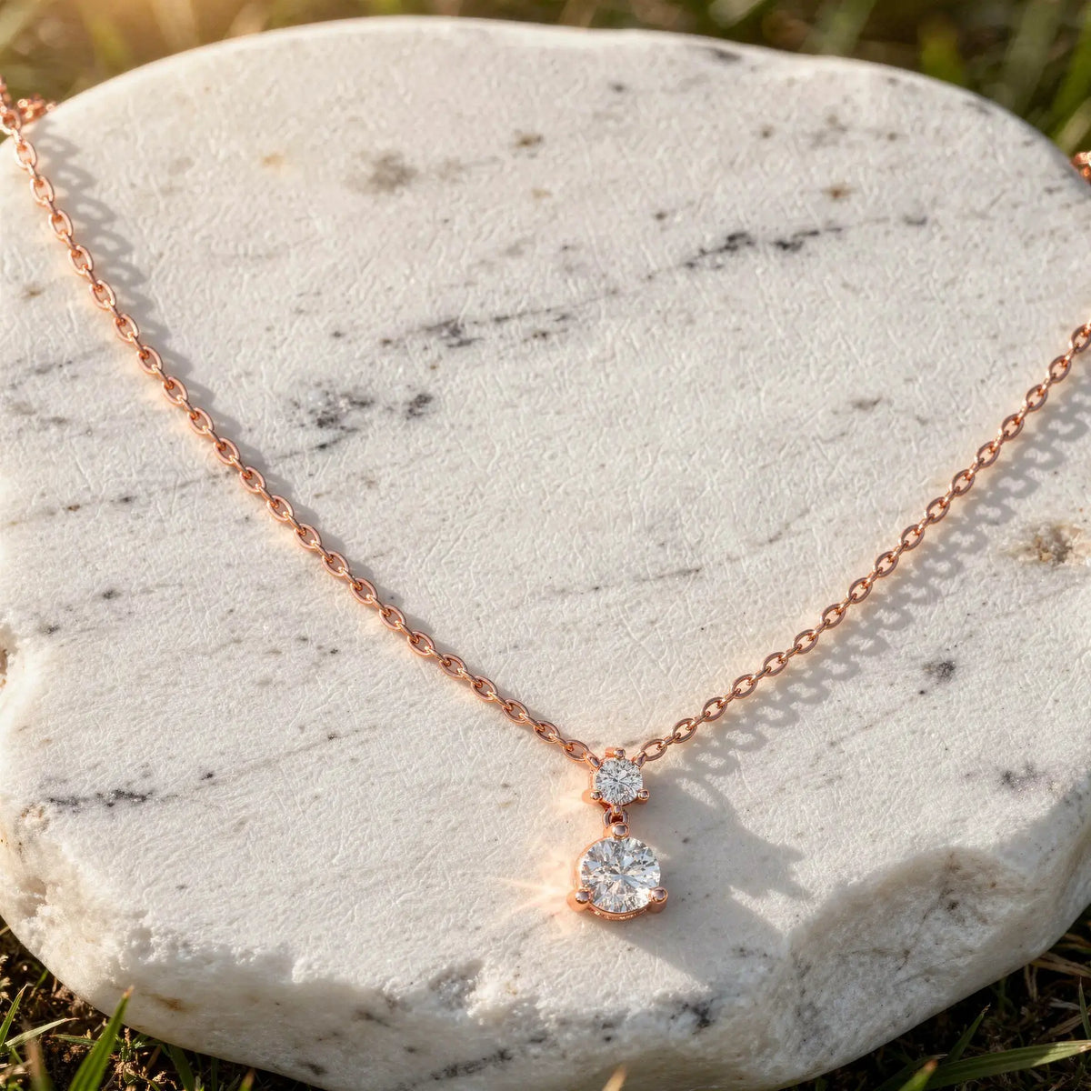 Close-up: Round Diamond Necklace with Solitaire Setting in 14k Rose Gold - Lab Grown - Driona Jewels