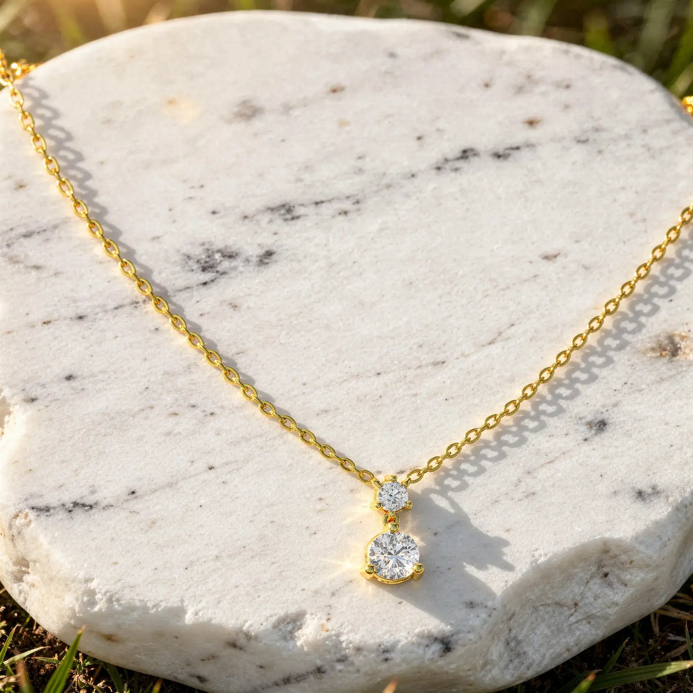 Flat Lay: Round Diamond Necklace with Solitaire Setting in 14k Yellow Gold - Lab Grown - Driona Jewels