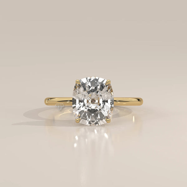 Nemma 5 Carat Cushion Lab Grown Diamond Solitaire, Hidden Halo in yellow gold, photographed head-on.
