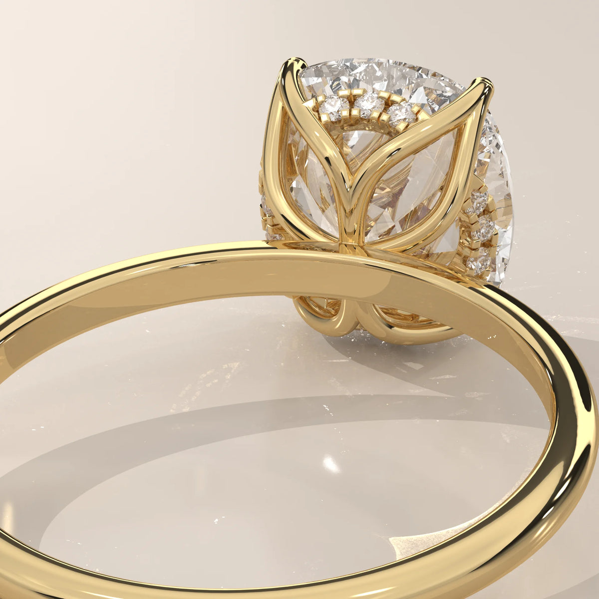 Nemma 5 Carat Cushion Lab Grown Diamond Solitaire, Hidden Halo in yellow gold, shown on a plain background.