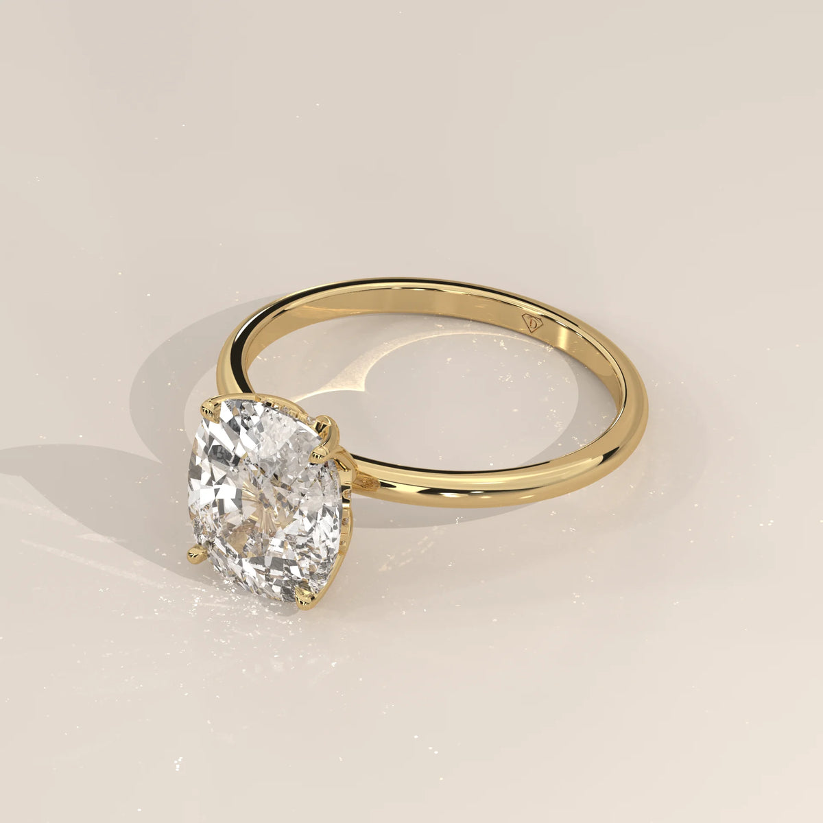 Nemma 5 Carat Cushion Lab Grown Diamond Solitaire, Hidden Halo in yellow gold, shown from the side.