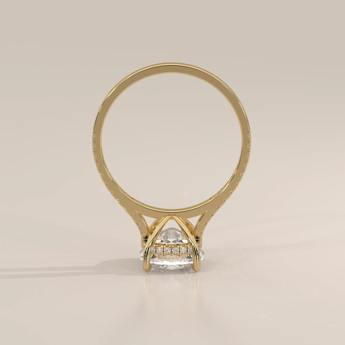Olive 5 Carat Cushion Lab Grown Diamond Ring, Hidden Halo Pave Band in yellow gold, shown on a plain background.