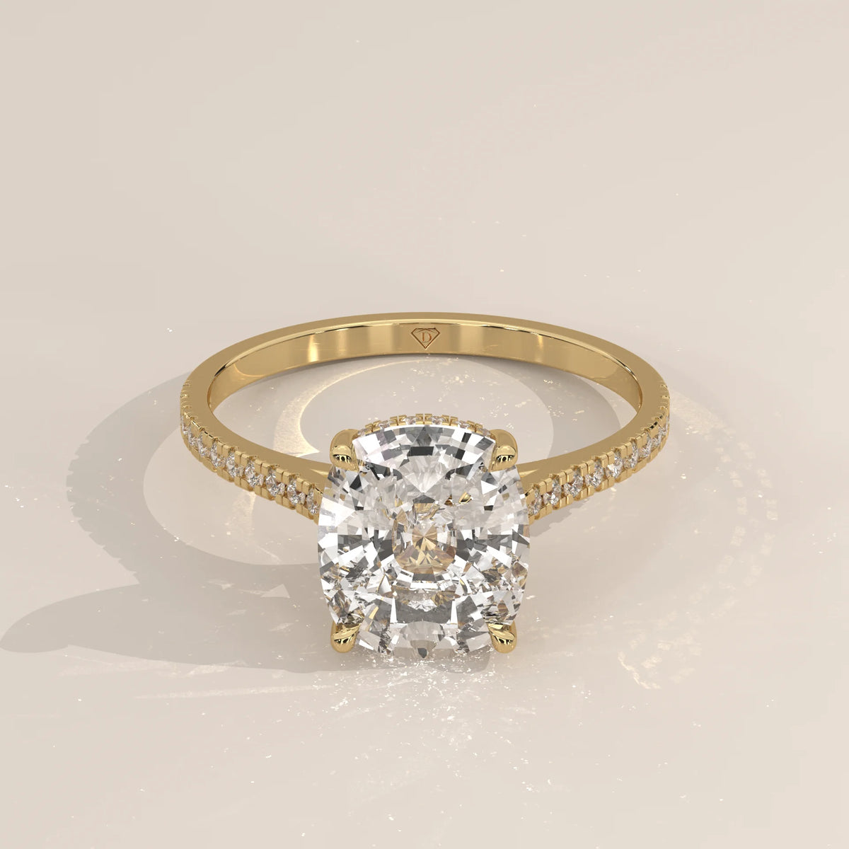 Olive 5 Carat Cushion Lab Grown Diamond Ring, Hidden Halo Pave Band in yellow gold, shown from the side.