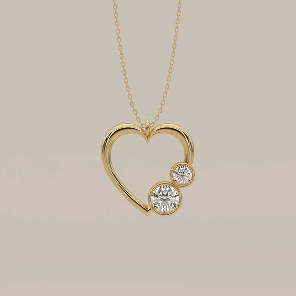 Open Heart Pendant with Two Bezel Round Lab Grown Diamonds in yellow gold, shown from the front.