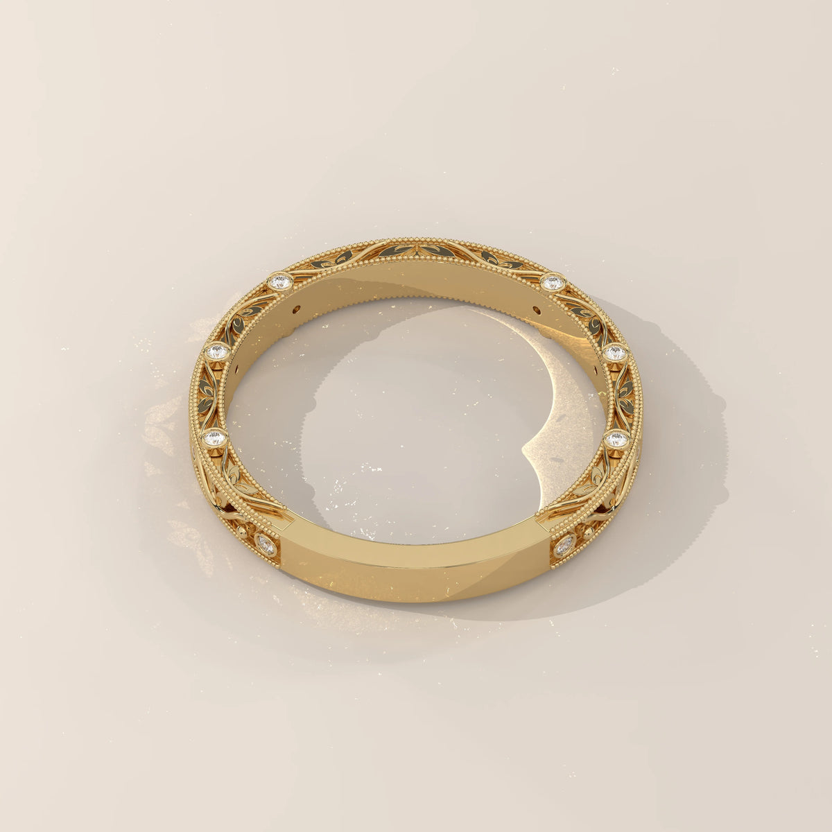 Ornate Filigree Engraved Band with Bezel Set Diamonds in yellow gold, shown on a plain background.