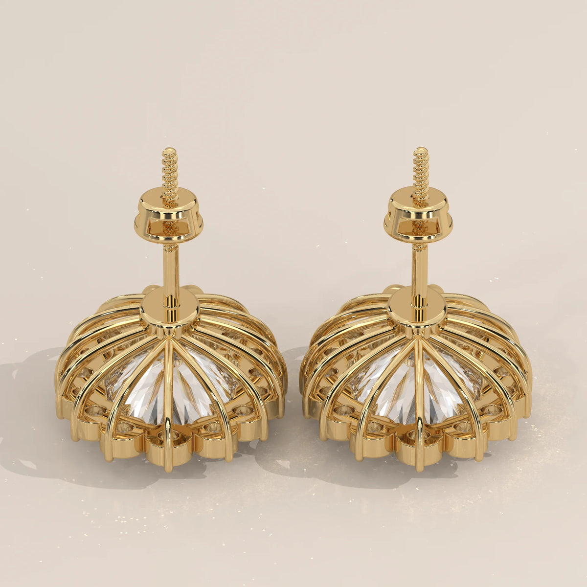 Oval Cluster Lab Grown Diamond Studs with Large Round Surround in yellow gold, studio photograph on a plain background.