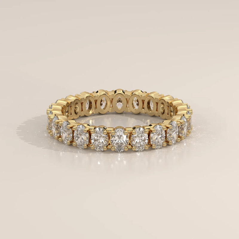 Three-Quarter View: Oval Diamond Eternity Ring with Eternity Setting in Yellow Gold – Lab Grown – Driona Jewels