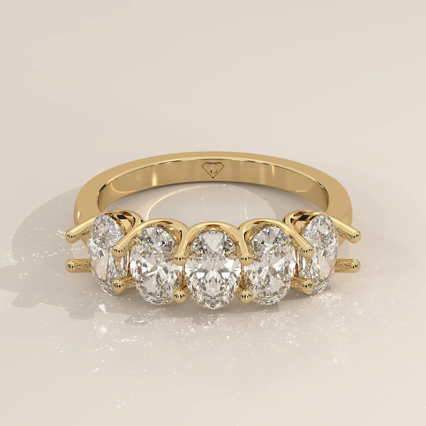 Three-Quarter View: Oval Diamond Band with Shared Prong Setting in Yellow Gold – Lab Grown – Driona Jewels