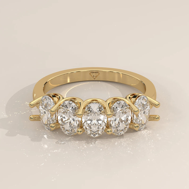 Three-Quarter View: Oval Diamond Band with Shared Prong Setting in Yellow Gold – Lab Grown – Driona Jewels