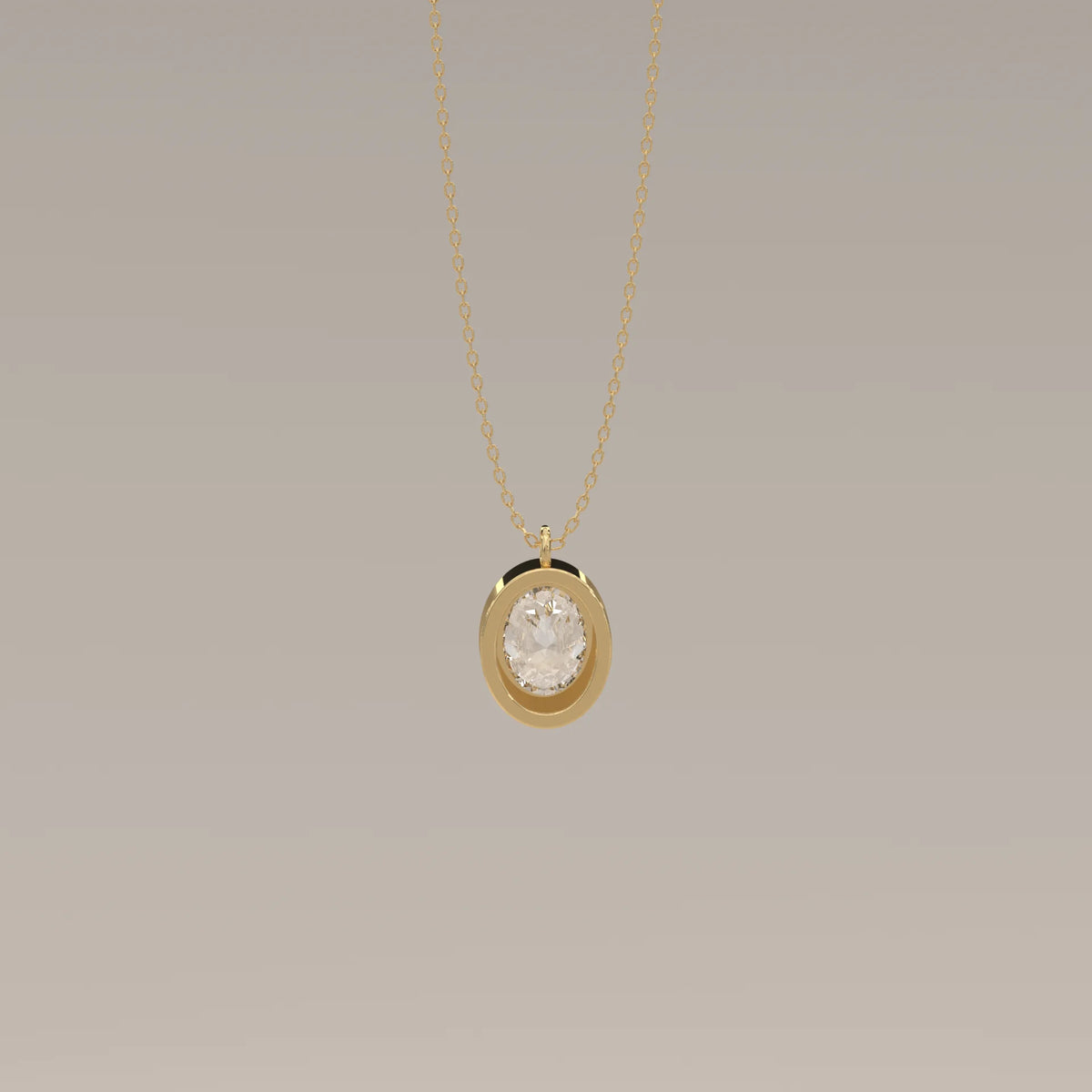 A delicate gold necklace with an oval-cut diamond pendant.