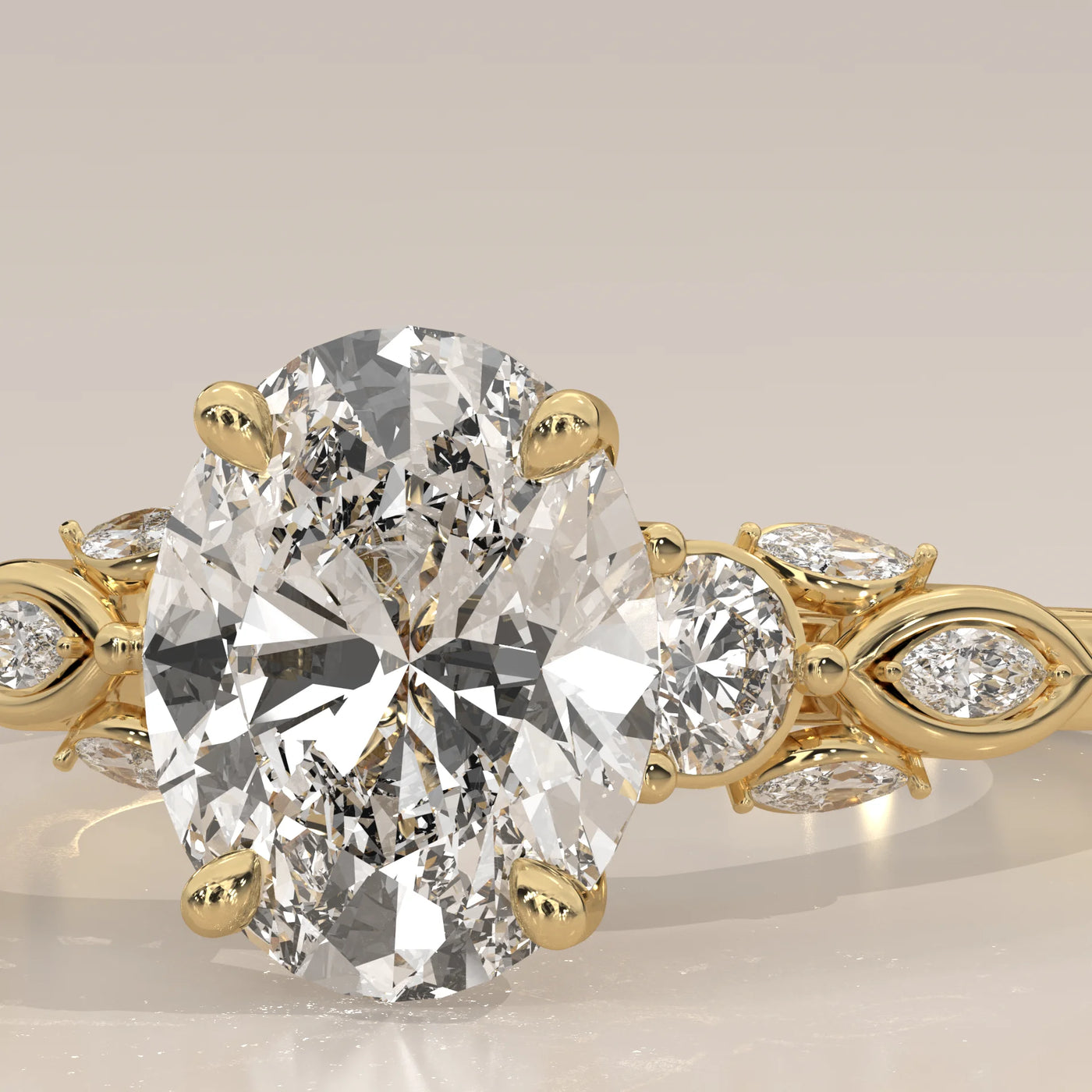 Gold ring with an oval-shaped diamond and leaf-like accents.