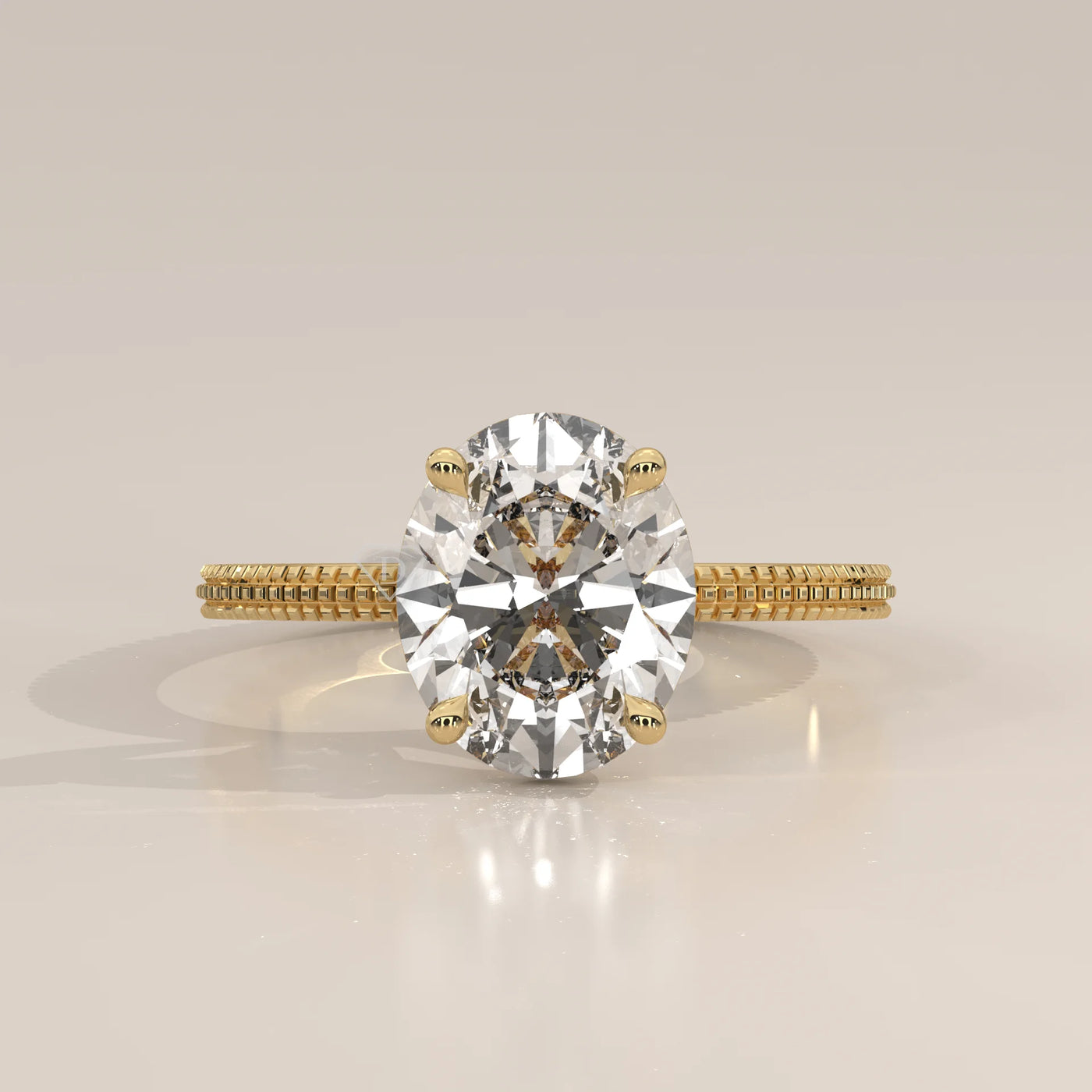 Oval cut diamond engagement ring with a paved band in yellow gold.