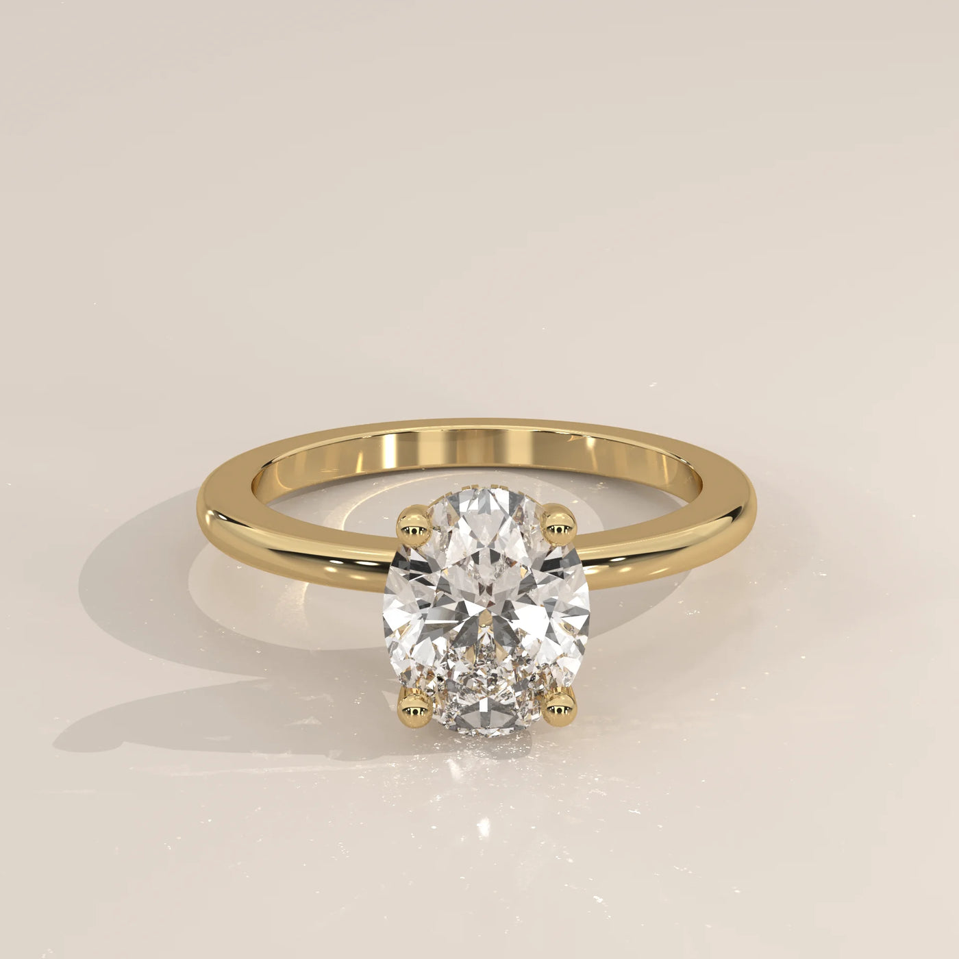 Oval cut diamond engagement ring with accent stones in 14k gold.