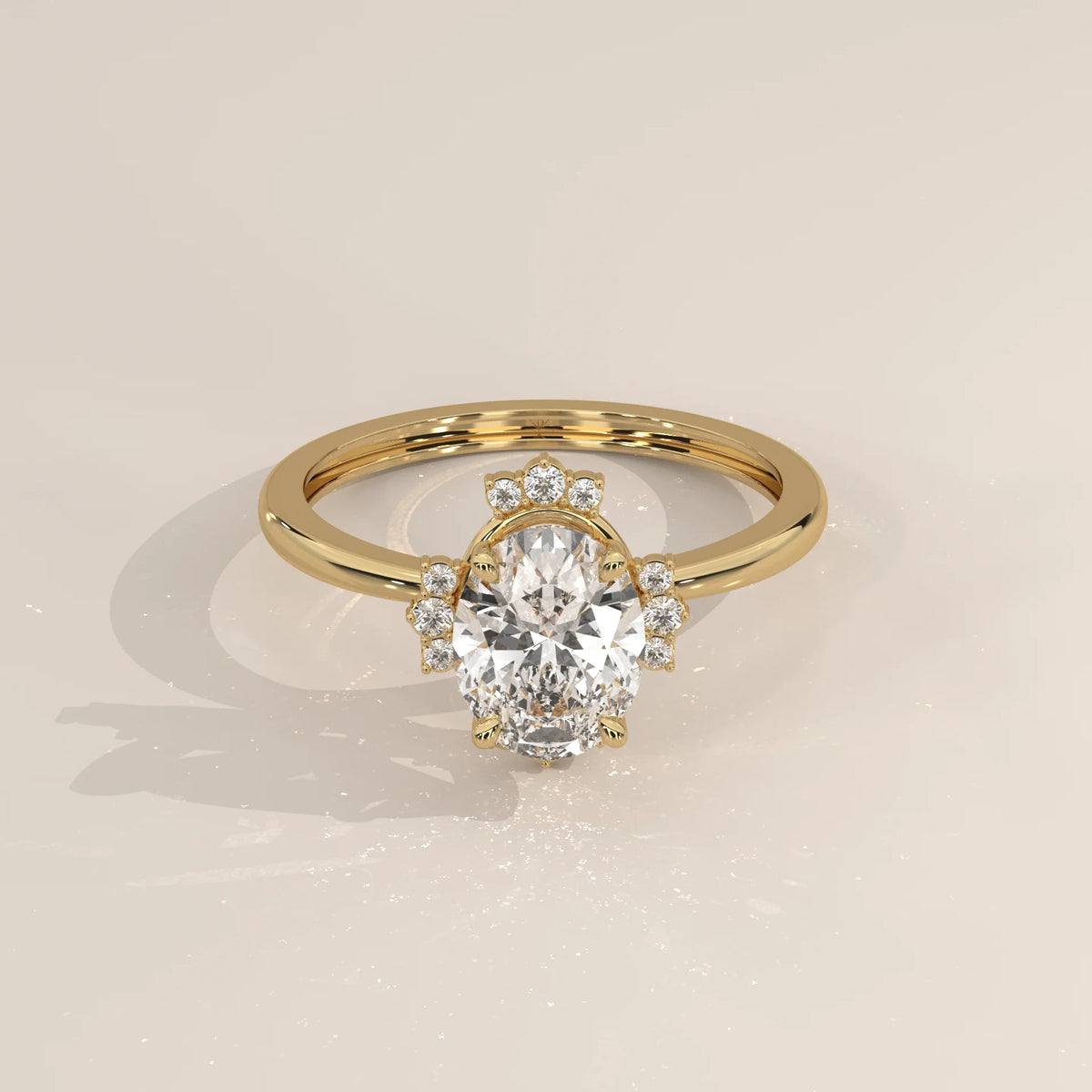 Oval Lab Grown Diamond Ring with Crown Style Partial Halo in yellow gold, front view on a plain background.