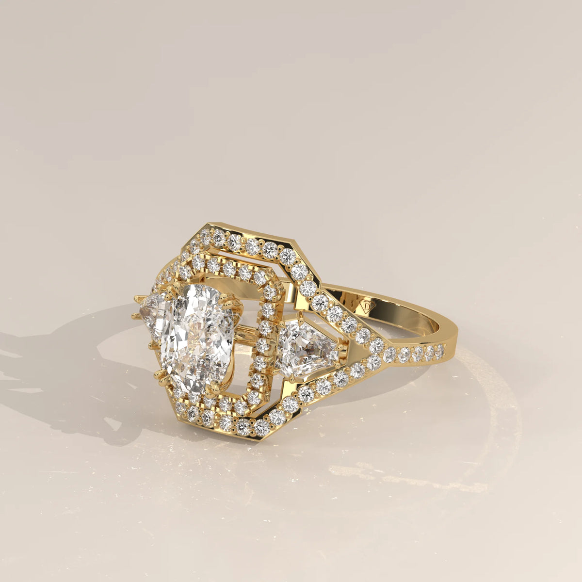 Cushion Lab Grown Diamond Art Deco Halo Ring with Shield Side Stones in yellow gold, shown from the side.