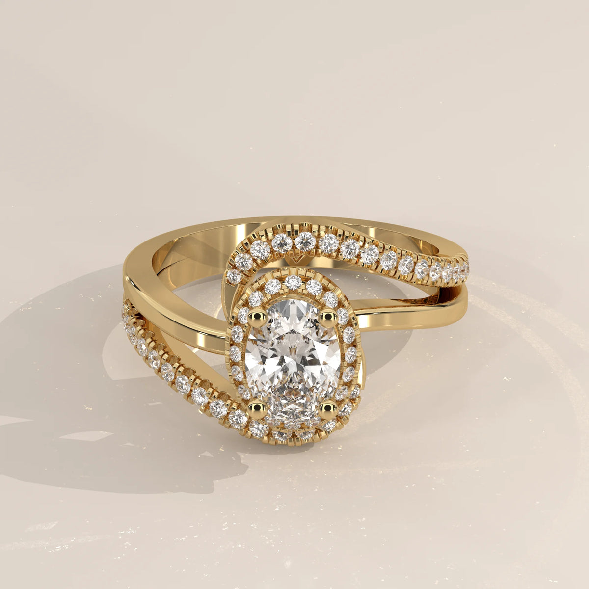 Oval Lab Grown Diamond Halo Ring with Swirling Pave Bypass in yellow gold, shown from the front.