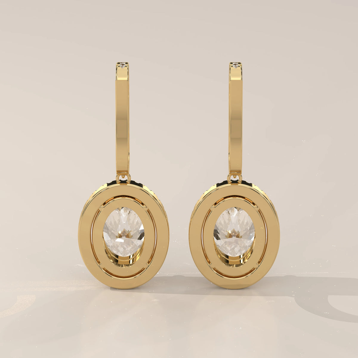 Oval Halo Lab Grown Diamond Drop Earrings with Pave Lever Back in yellow gold, photographed head-on.