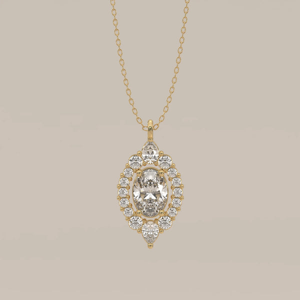 Oval Lab Grown Diamond Halo Pendant with Pear Accents Top and Bottom in yellow gold, shown from the front.