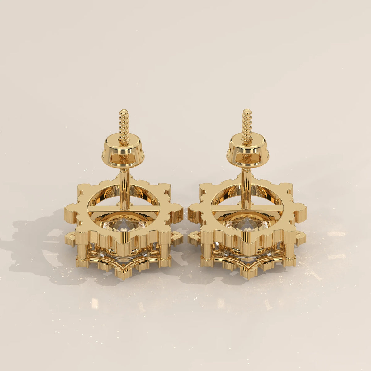 Oval Lab Grown Diamond Studs in a Snowflake Point Halo in yellow gold, studio photograph on a plain background.