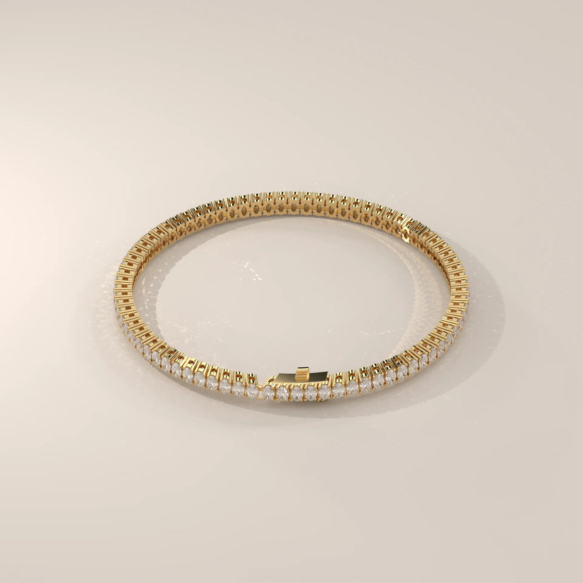 Oval Lab Grown Diamond Tennis Bracelet in Four Prong Settings in yellow gold, shown at an angle.