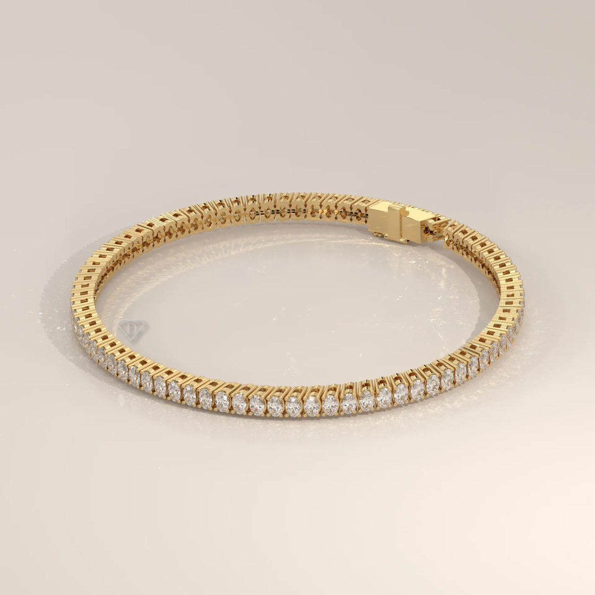 Oval Lab Grown Diamond Tennis Bracelet in Four Prong Settings in yellow gold, photographed head-on.