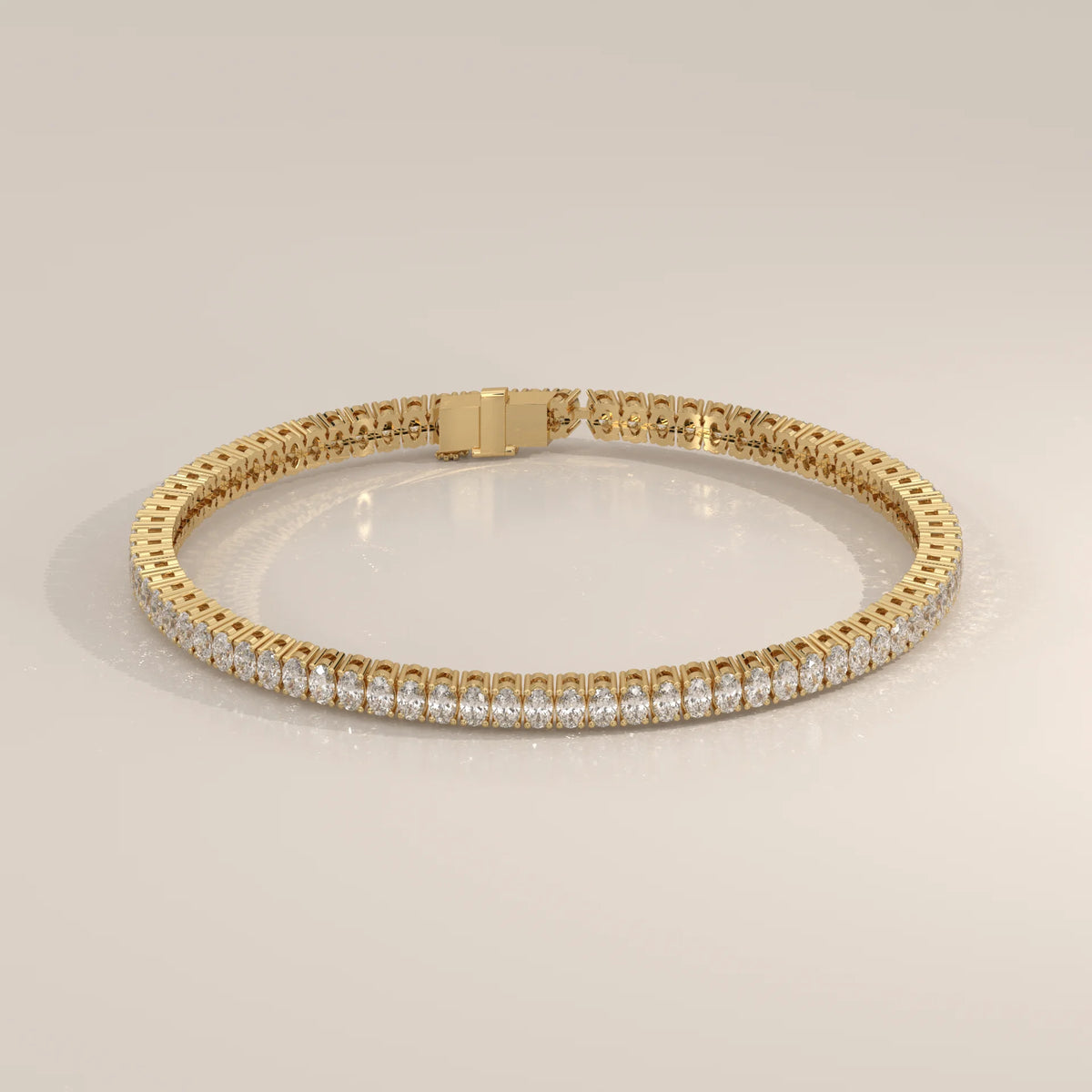 Oval Lab Grown Diamond Tennis Bracelet in Four Prong Settings in yellow gold, shown from the side.