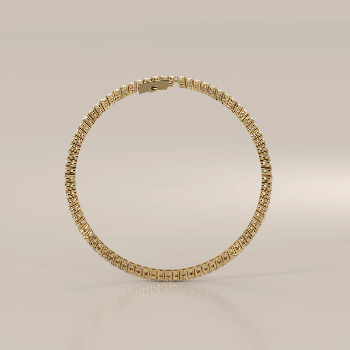 Oval Lab Grown Diamond Tennis Bracelet in Four Prong Settings in yellow gold, shown on a plain background.