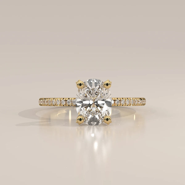 Oval Lab Grown Diamond Pave Band Ring with Hidden Halo in yellow gold, photographed head-on.