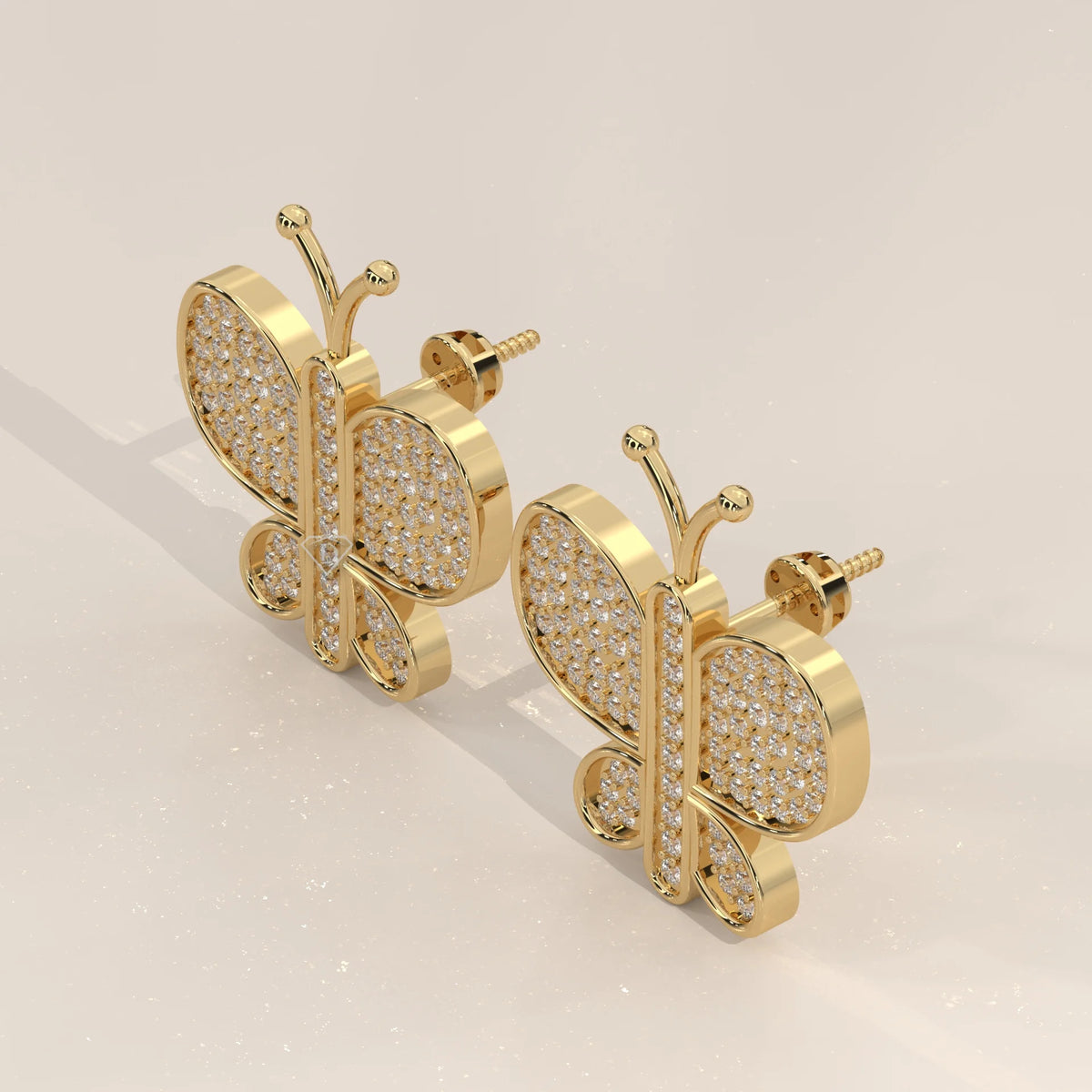 Pave Butterfly Lab Grown Diamond Stud Earrings with Swirl Wings in yellow gold, shown on a plain background.