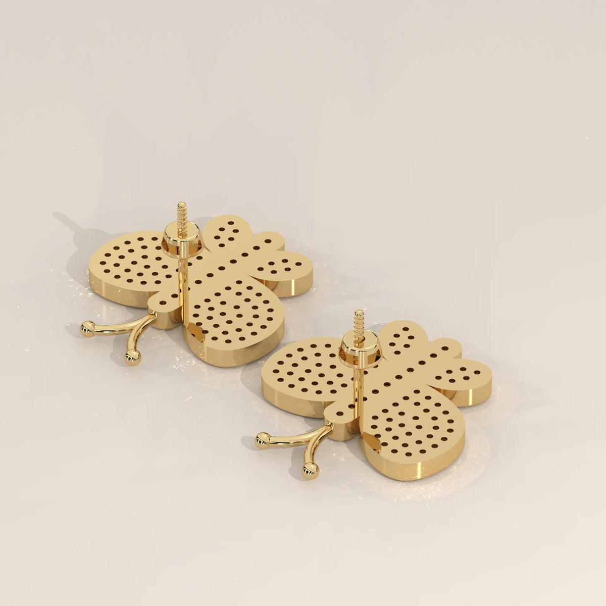 Pave Butterfly Lab Grown Diamond Stud Earrings with Swirl Wings in yellow gold, product photograph on a plain background.