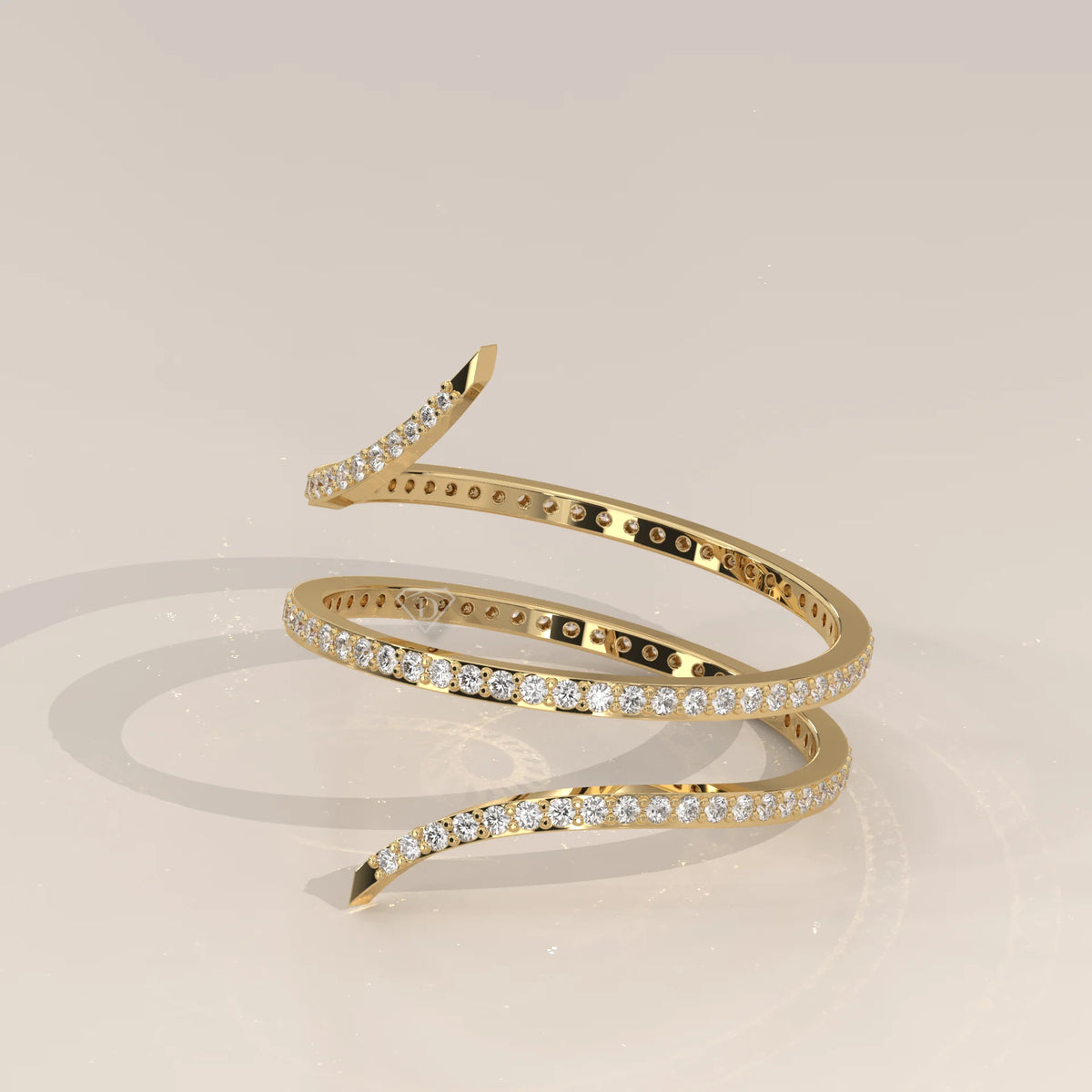 Round Lab Grown Diamond Pave Coil Ring with Tapered Pointed Ends in yellow gold, shown from the side.