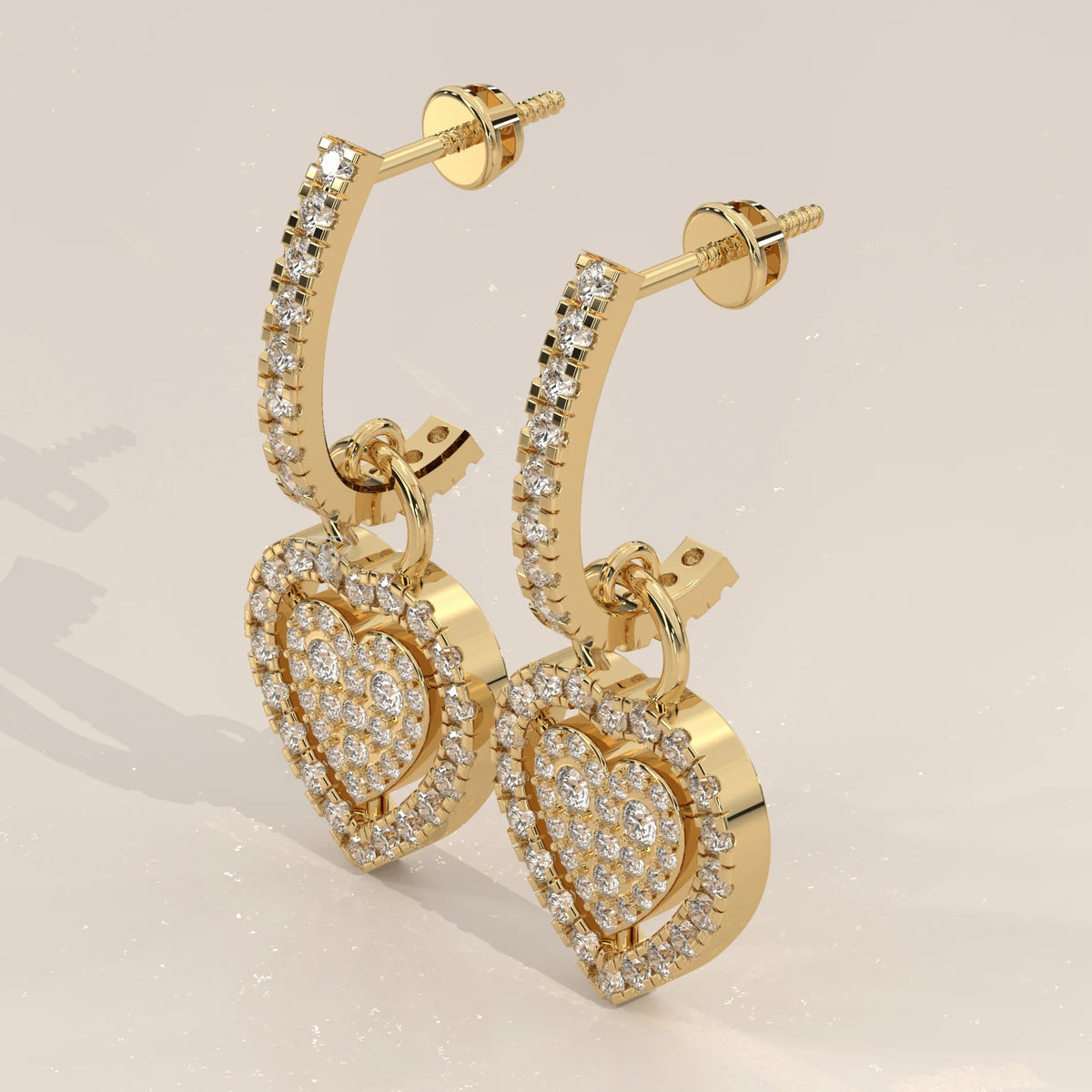 Pave Heart Lab Grown Diamond Drop Earrings on a Half Hoop Post in yellow gold, shown from the side.