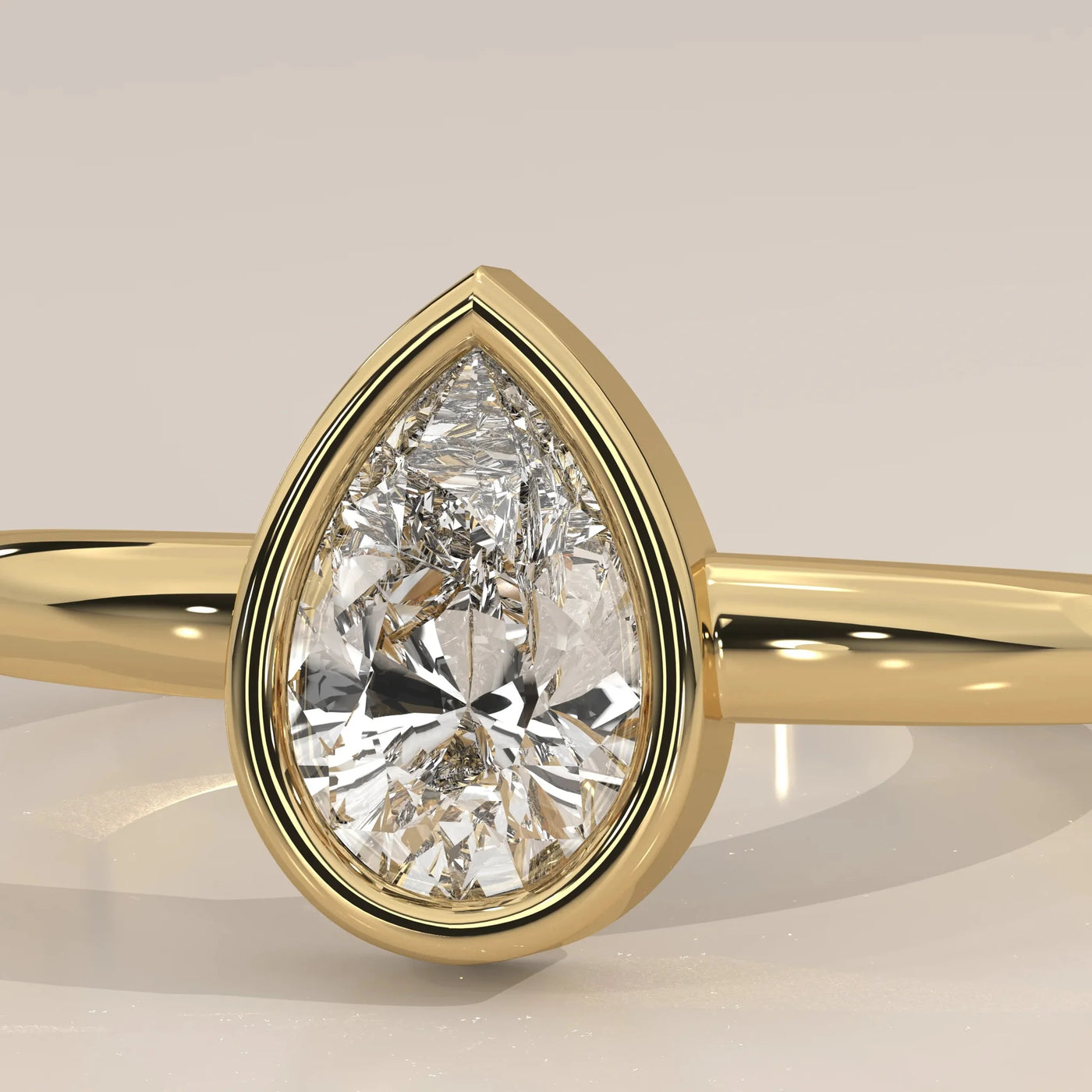 Front View: Pear Diamond Ring with Bezel Setting in Yellow Gold – Lab Grown – Driona Jewels