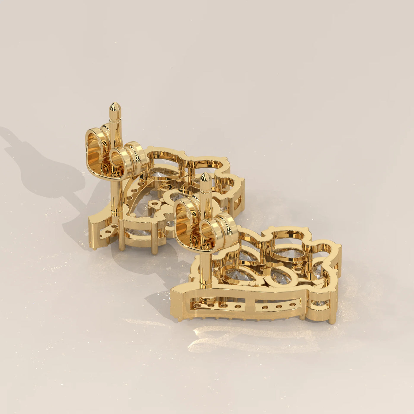 Angle View: Pear Diamond Stud Earrings with Cluster Setting in Yellow Gold – Lab Grown – Driona Jewels