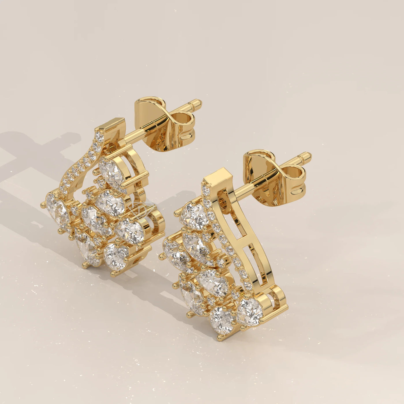 Three-Quarter View: Pear Diamond Stud Earrings with Cluster Setting in Yellow Gold – Lab Grown – Driona Jewels