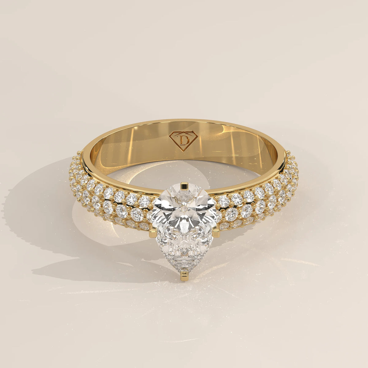 Three-Quarter View: Pear Diamond Engagement Ring with Pavé Setting in Yellow Gold – Lab Grown – Driona Jewels