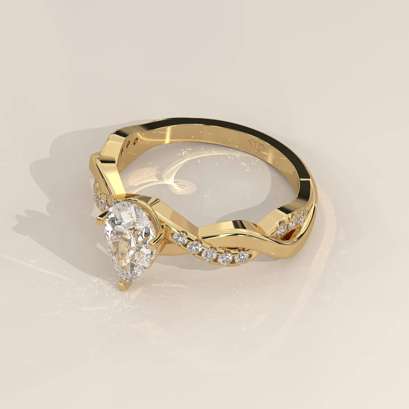 Angle View: Pear Diamond Engagement Ring with Twisted Setting in Yellow Gold – Lab Grown – Driona Jewels