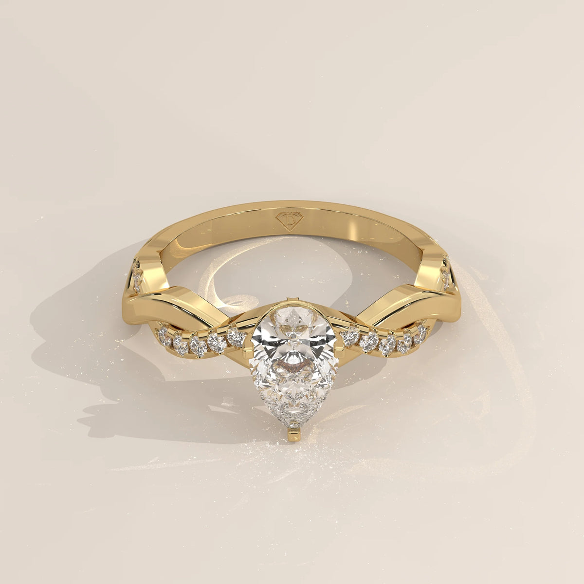 Three-Quarter View: Pear Diamond Engagement Ring with Twisted Setting in Yellow Gold – Lab Grown – Driona Jewels