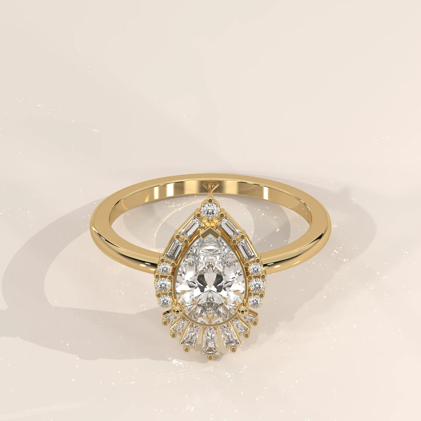 Elegant 14k yellow gold ring with a pear-cut diamond halo setting