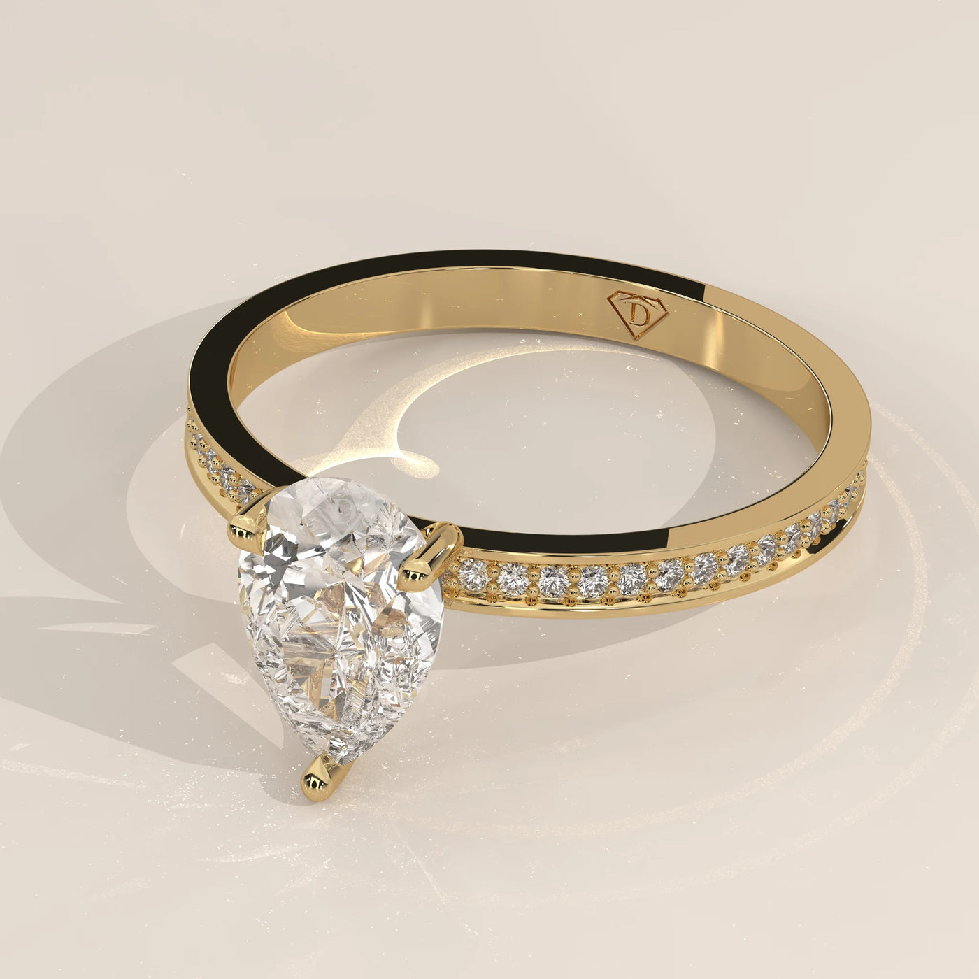 Angle View: Pear Diamond Engagement Ring with Solitaire Setting in Yellow Gold – Lab Grown – Driona Jewels