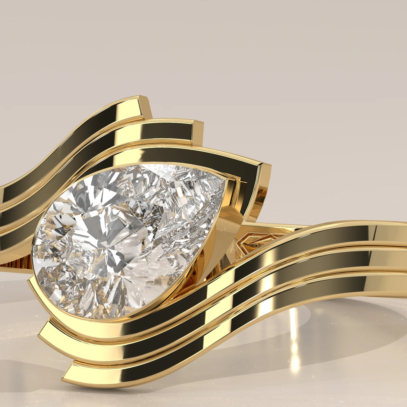 Yellow gold ring with a prominent pear-cut diamond.