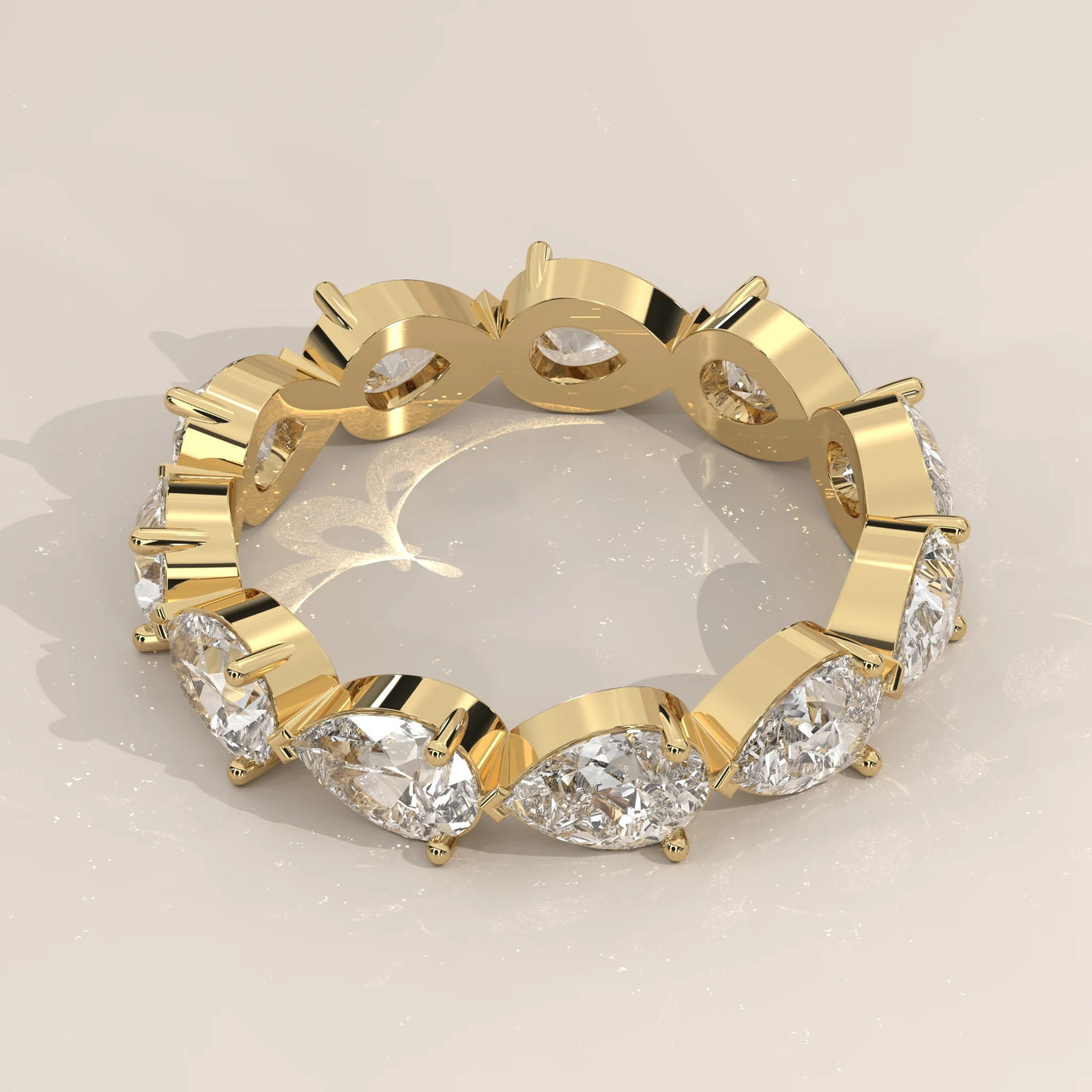 Angle View: Pear Diamond Eternity Band with Eternity Setting in Yellow Gold – Lab Grown – Driona Jewels