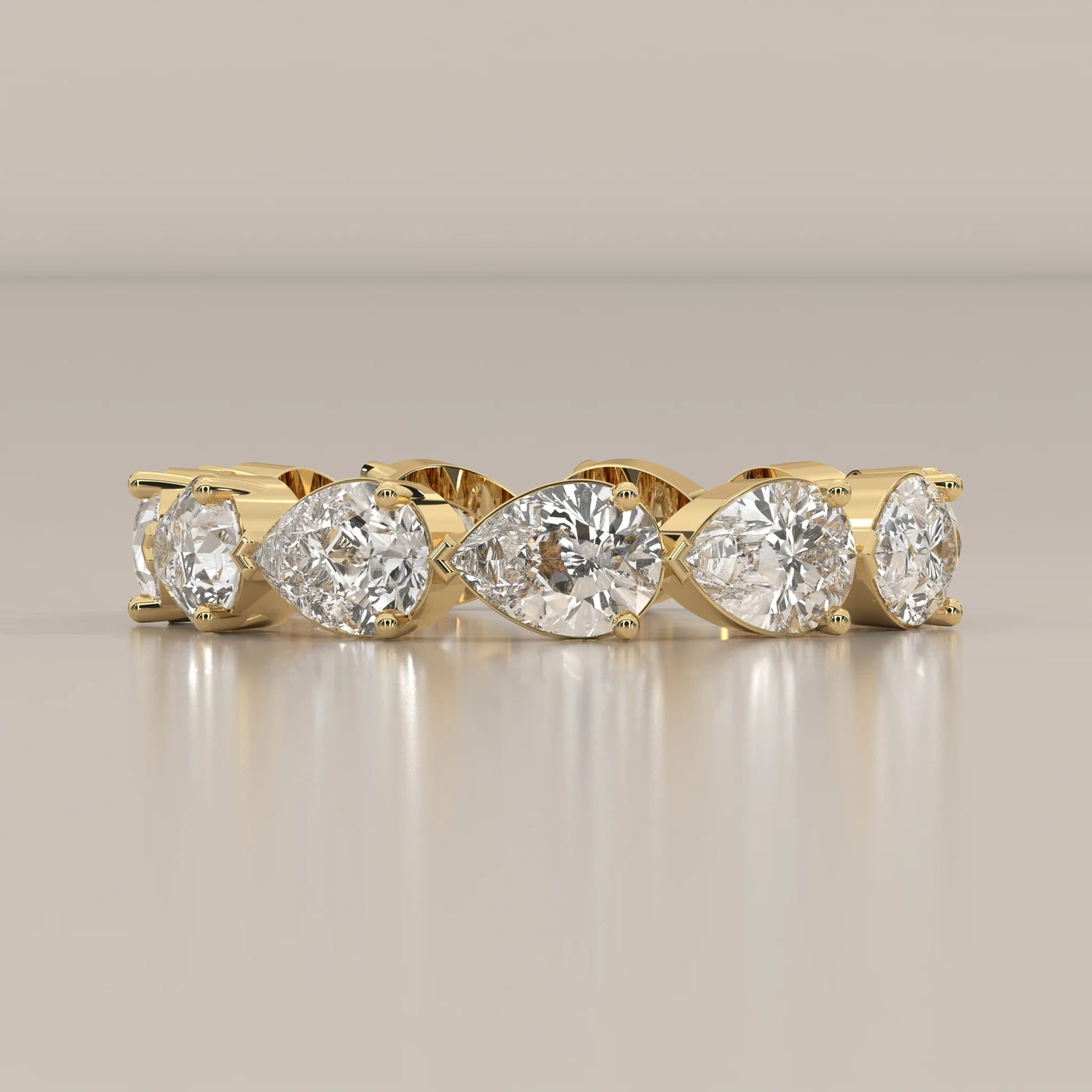 Side Profile: Pear Diamond Eternity Band with Eternity Setting in Yellow Gold – Lab Grown – Driona Jewels