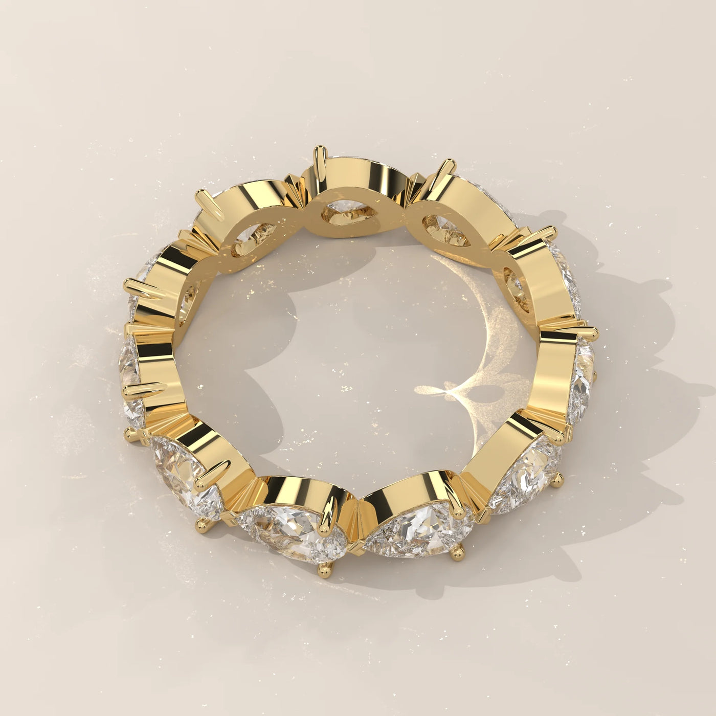 Top View: Pear Diamond Eternity Band with Eternity Setting in Yellow Gold – Lab Grown – Driona Jewels