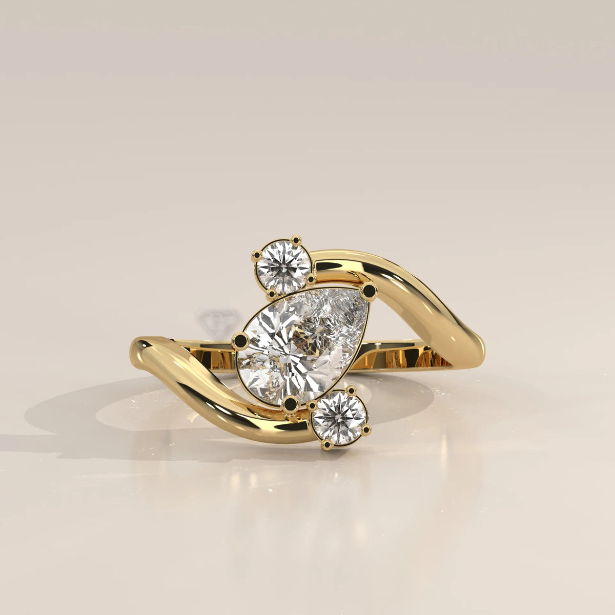 Elegant 14k gold ring with a pear-shaped diamond and intricate band design.