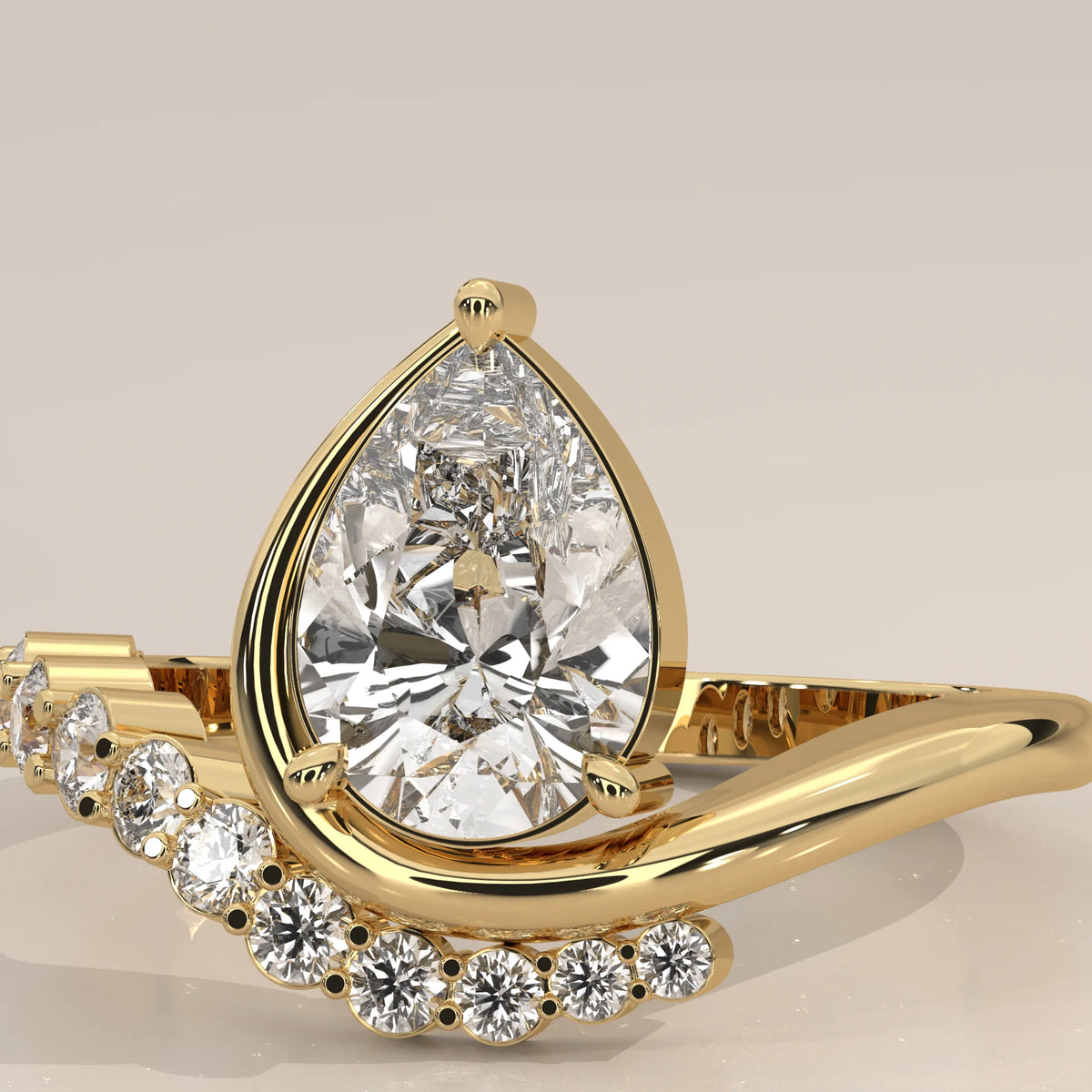 Pear Lab Grown Diamond Bypass Ring with Graduated Crescent Accents in yellow gold, front view on a plain background.