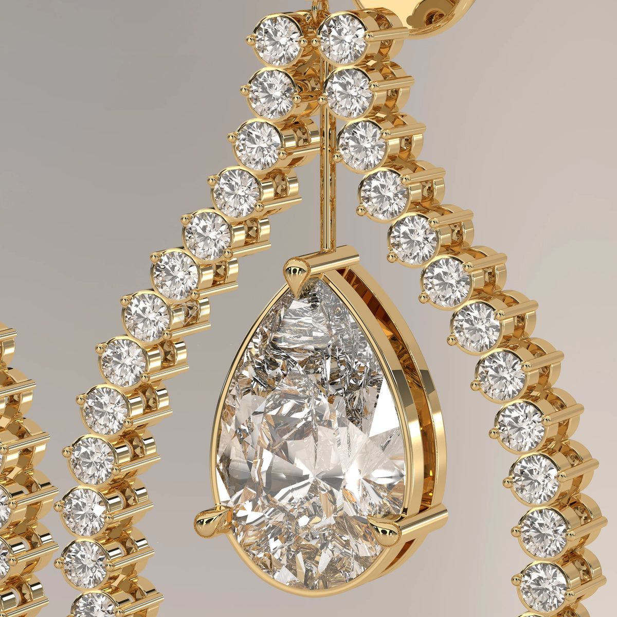 Pear Drop Lab Grown Diamond Earrings in an Open Teardrop Frame in yellow gold, shown on a plain background.