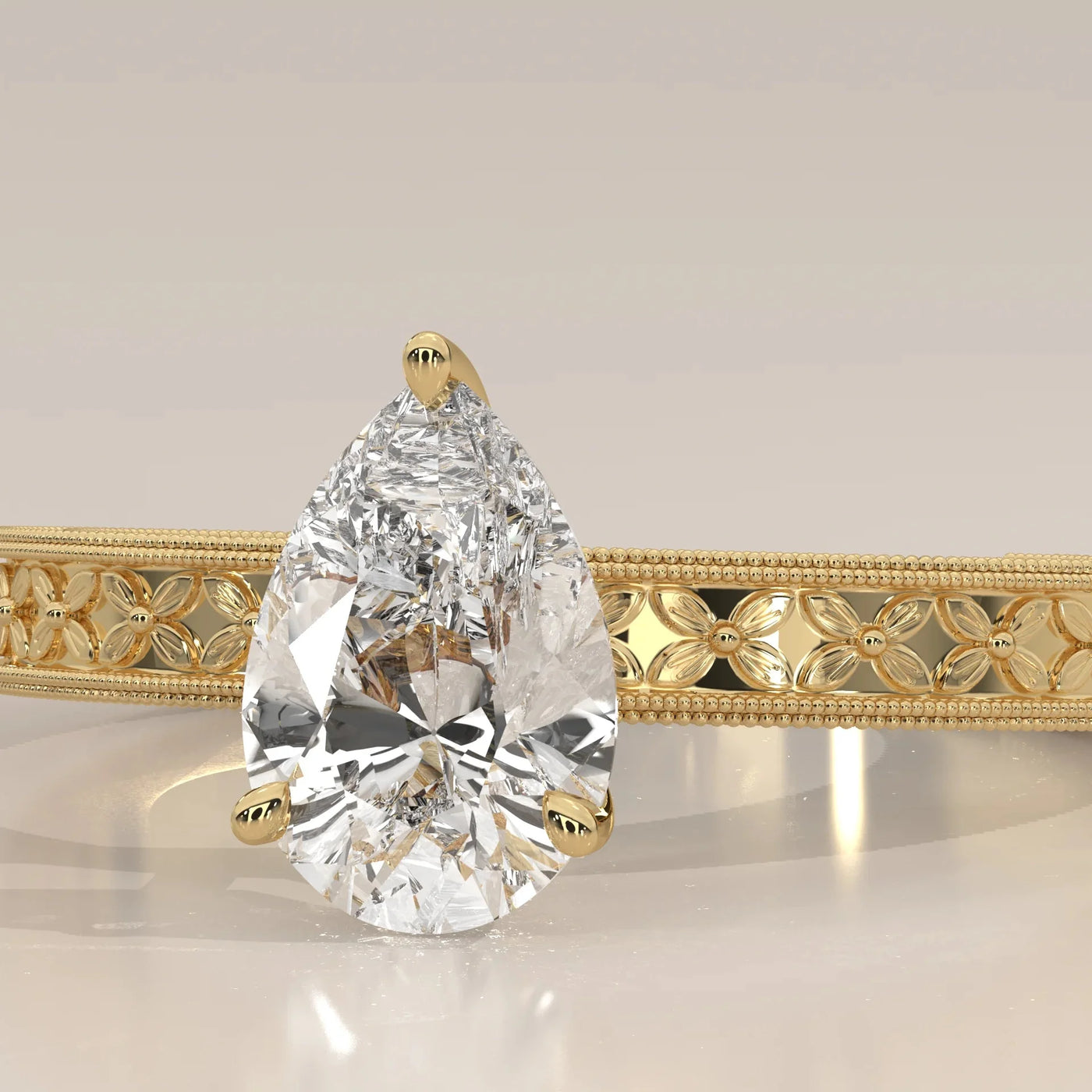 Close-Up: Pear Diamond Ring with Solitaire Setting in Yellow Gold – Lab Grown – Driona Jewels