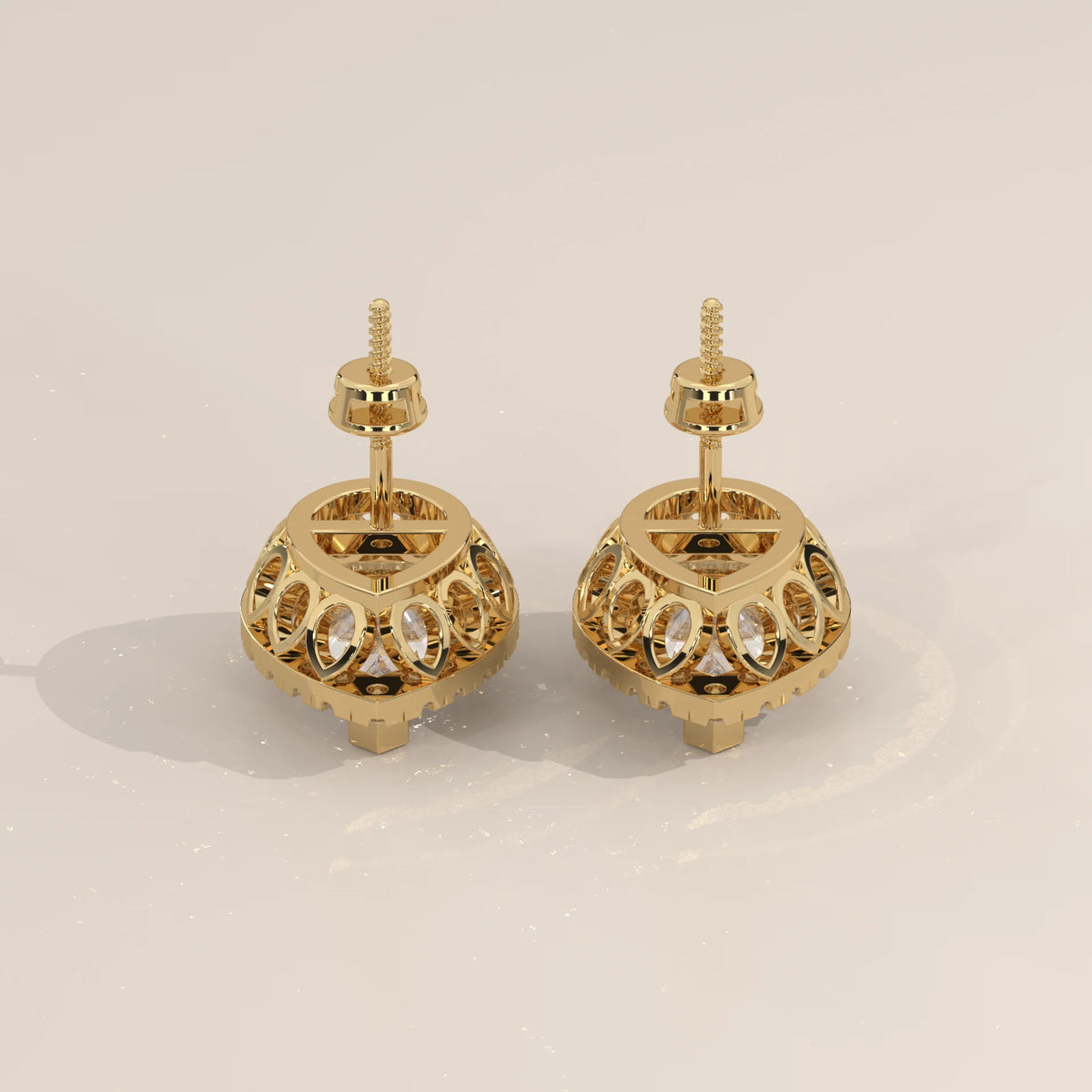 Pear Halo Lab Grown Diamond Studs with Teardrop Cut Out Gallery in yellow gold, photographed head-on.