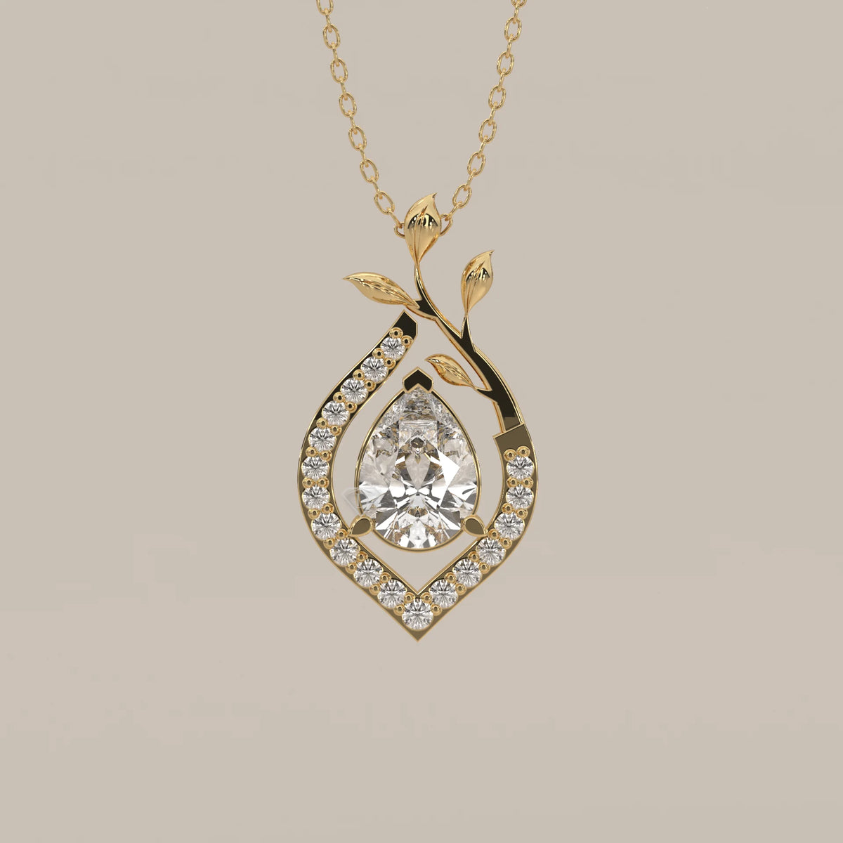 Pear Lab Grown Diamond Pendant in a Pave Teardrop with Leaf Vine in yellow gold, front view on a plain background.